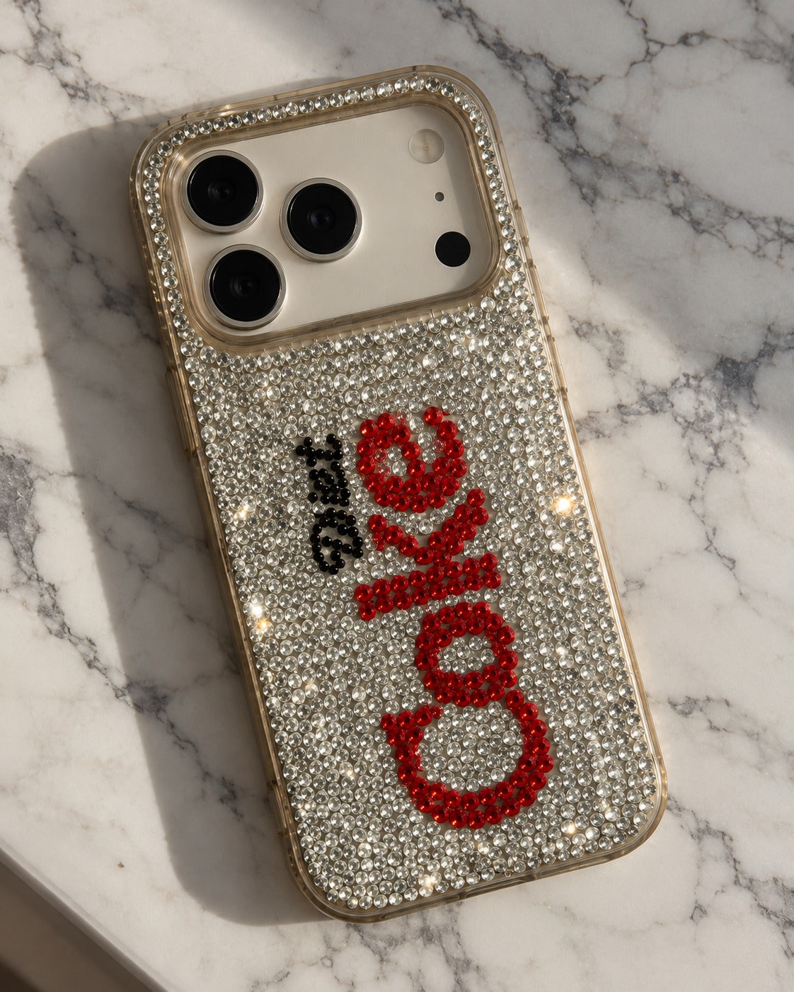 Silver crystal phone case on marble