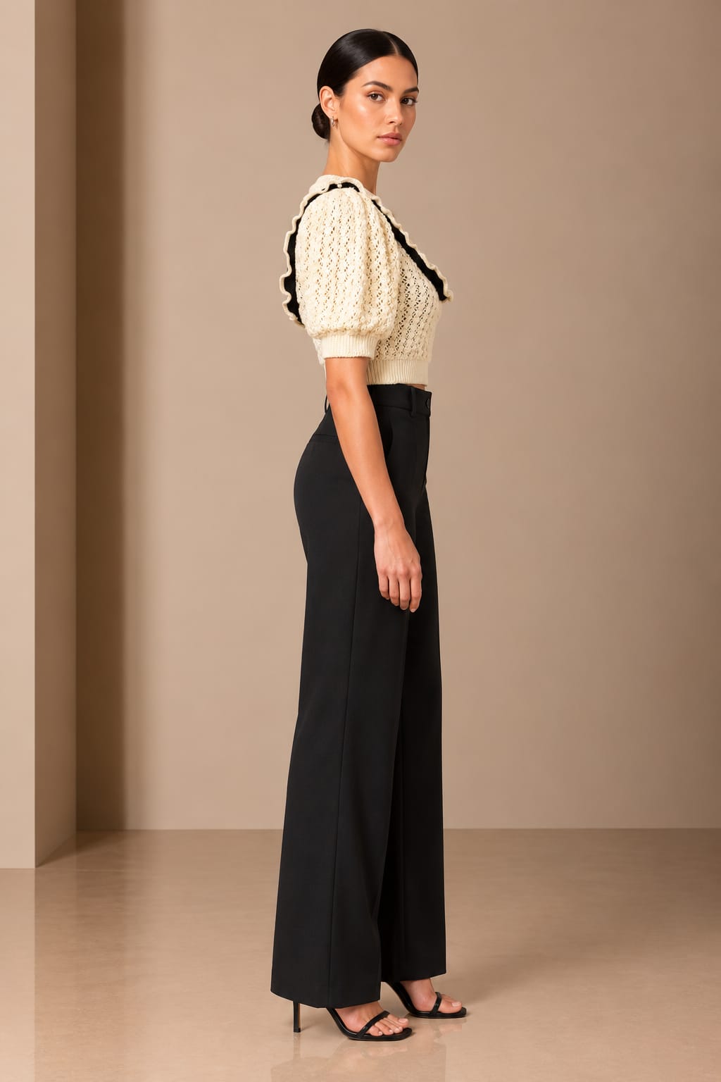 Side view showing the puff sleeve and cropped length