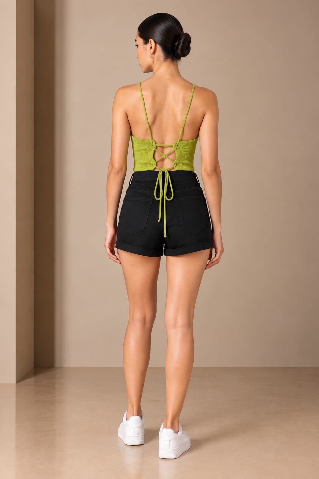 Back view showing the rope straps laced and tied at the centre