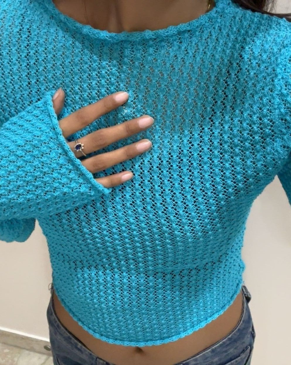 Sky Blue Open-Knit Flare-Sleeve Crop Top, the actual piece worn