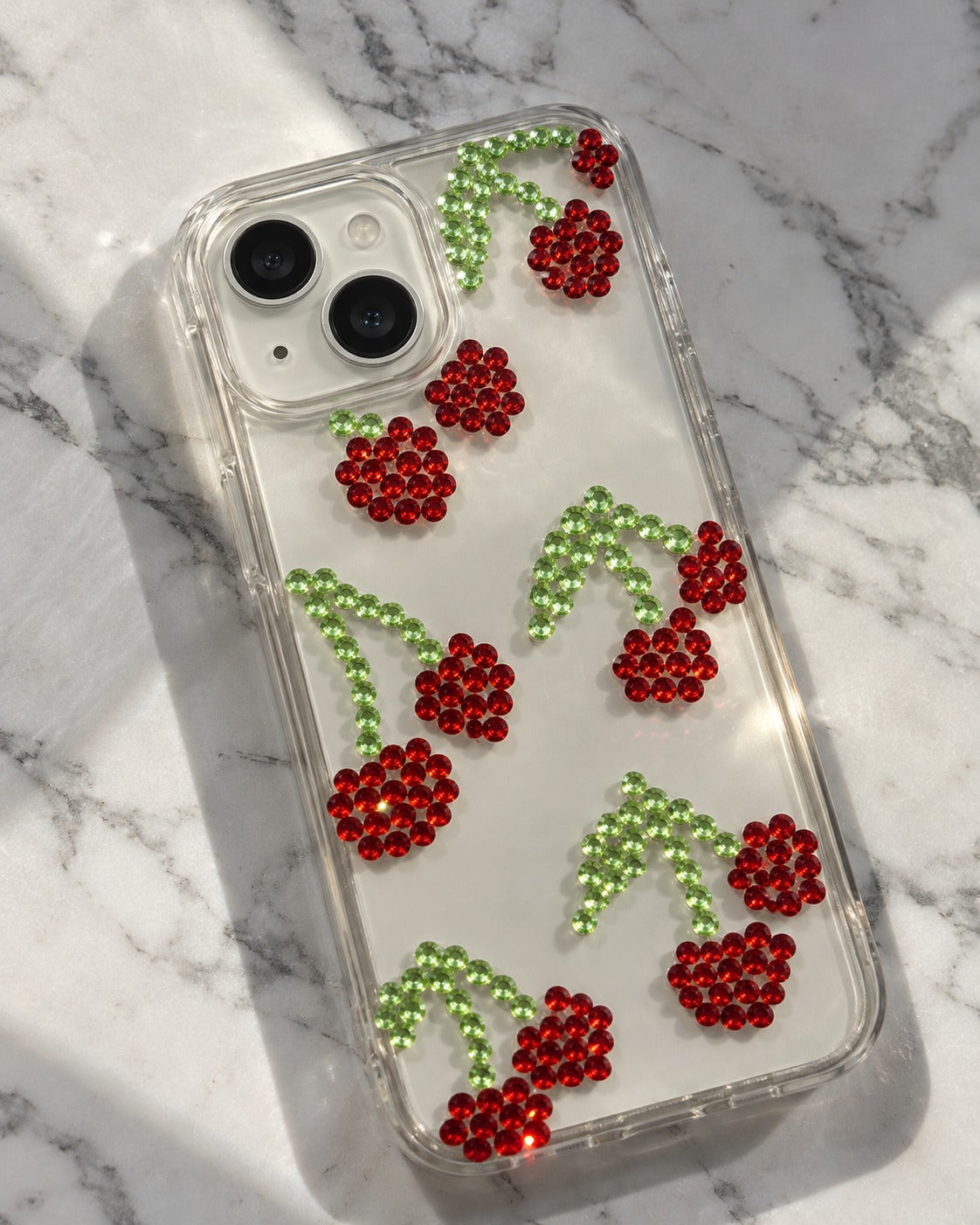 Cherry crystal clear phone case on marble