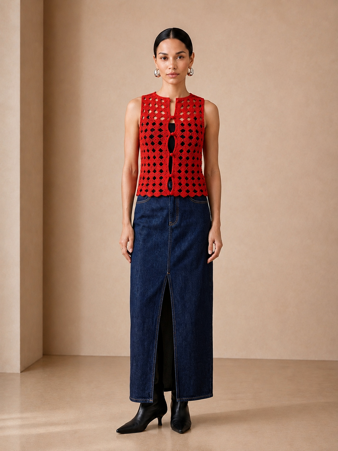 Scarlet Medallion Crochet Vest front view over a black tank with denim skirt